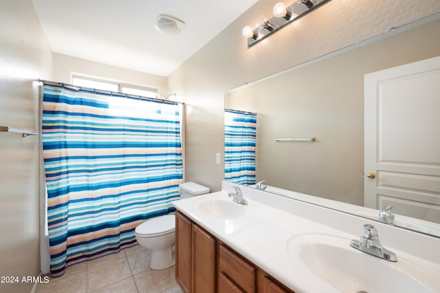 full bathroom with vanity, tile patterned flooring, toilet, and shower / bathtub combination with curtain