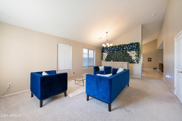 living room featuring light colored carpet, a chandelier, and high vaulted ceiling