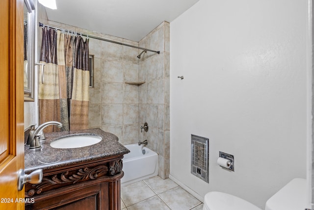 full bathroom with toilet, tile patterned floors, vanity, heating unit, and shower / bath combination with curtain