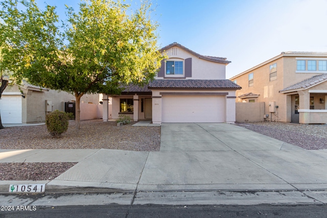 view of front of home with a garage