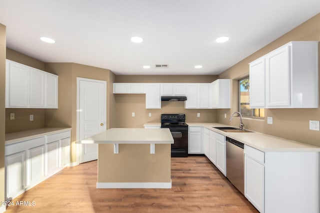 kitchen featuring dishwasher, a center island, sink, black range with electric cooktop, and white cabinetry