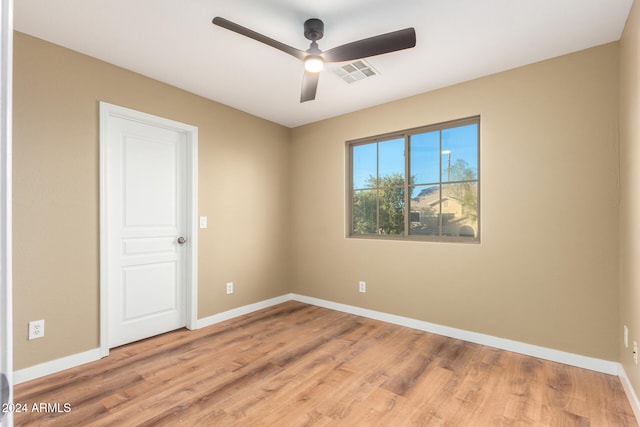 unfurnished room with light hardwood / wood-style floors and ceiling fan