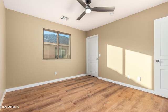 unfurnished room featuring ceiling fan and light hardwood / wood-style floors