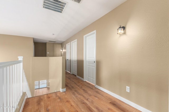 hall featuring light hardwood / wood-style floors