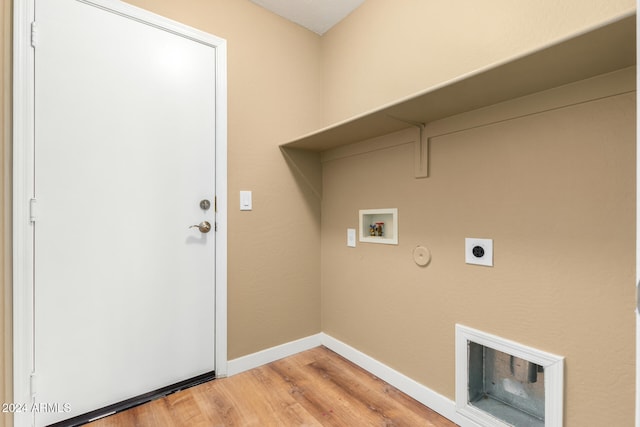 laundry area with washer hookup, hardwood / wood-style floors, hookup for a gas dryer, and electric dryer hookup