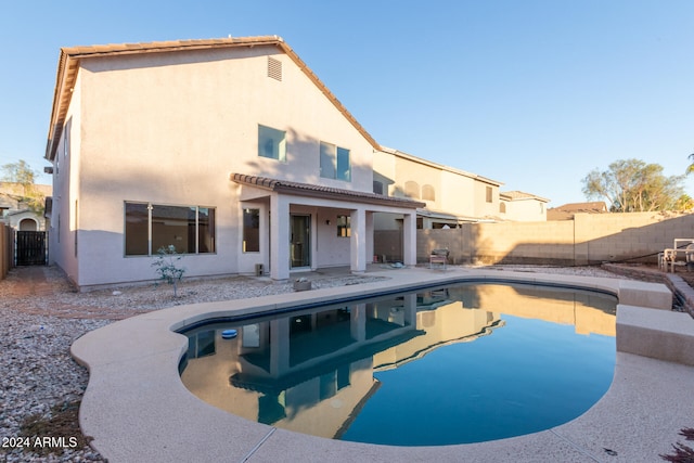 view of pool featuring a patio area