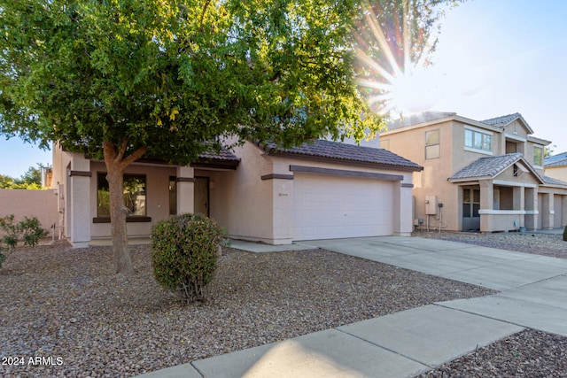 view of front of property featuring a garage