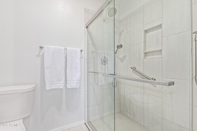 9450 E Becker Ln Unit 1046, Scottsdale, AZ 85260 - bathroom featuring toilet and a shower stall