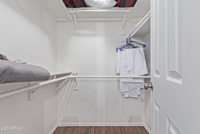9450 E Becker Ln Unit 1046, Scottsdale, AZ 85260 - spacious closet featuring wood finished floors