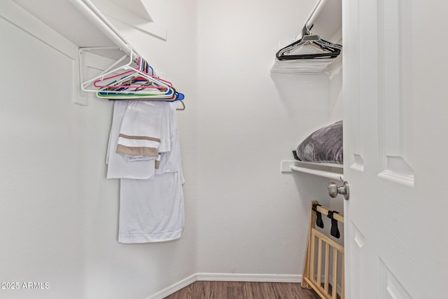 9450 E Becker Ln Unit 1046, Scottsdale, AZ 85260 - spacious closet featuring wood finished floors