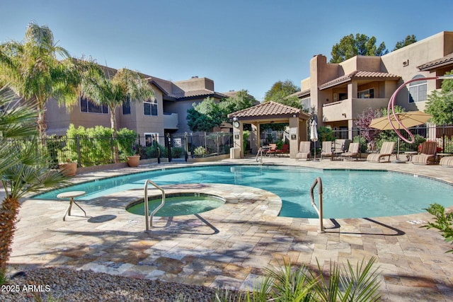 9450 E Becker Ln Unit 1046, Scottsdale, AZ 85260 - community pool with a gazebo, a community hot tub, and a patio