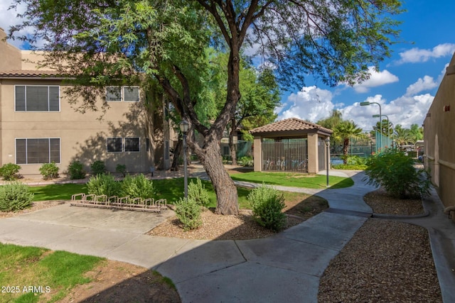 9450 E Becker Ln Unit 1046, Scottsdale, AZ 85260 - view of property's community with a gazebo and a yard
