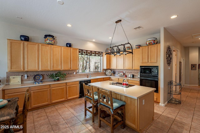 5336 E Gloria Ln, Cave Creek, AZ 85331 - kitchen featuring black appliances, backsplash, light tile patterned flooring, light countertops, and recessed lighting