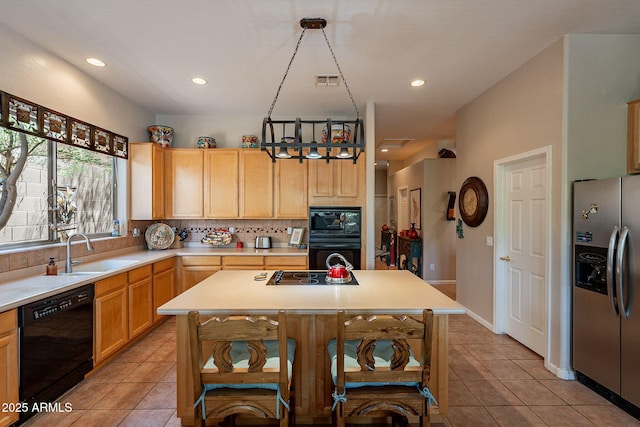 5336 E Gloria Ln, Cave Creek, AZ 85331 - kitchen featuring black appliances, a sink, light countertops, light tile patterned flooring, and recessed lighting
