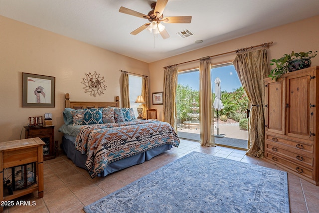 5336 E Gloria Ln, Cave Creek, AZ 85331 - bedroom featuring access to exterior, light tile patterned flooring, and a ceiling fan