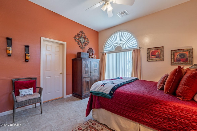 5336 E Gloria Ln, Cave Creek, AZ 85331 - bedroom with baseboards, ceiling fan, and light tile patterned flooring