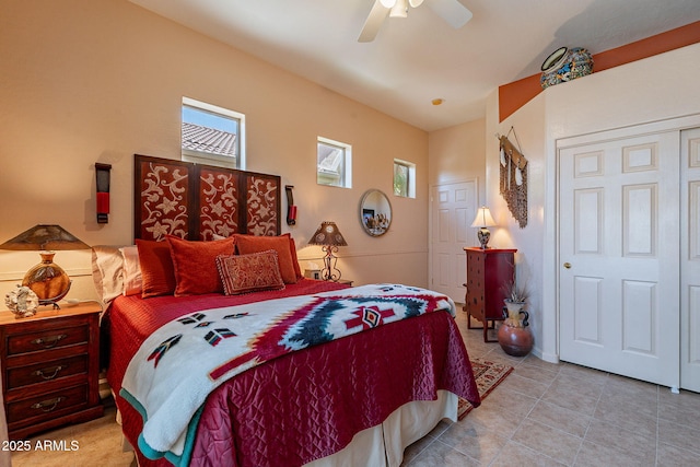 5336 E Gloria Ln, Cave Creek, AZ 85331 - tiled bedroom featuring multiple windows and a ceiling fan