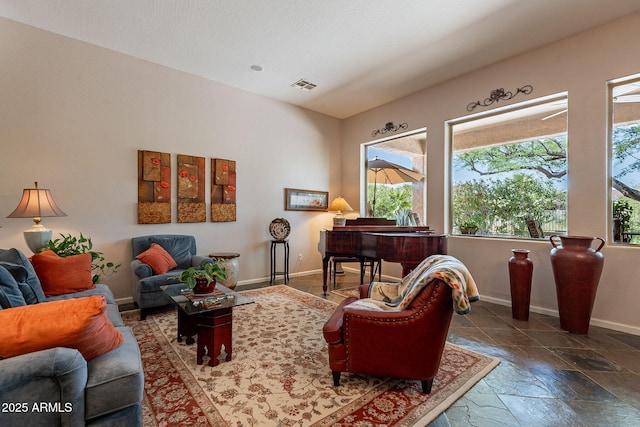 5336 E Gloria Ln, Cave Creek, AZ 85331 - living area with baseboards and stone tile flooring