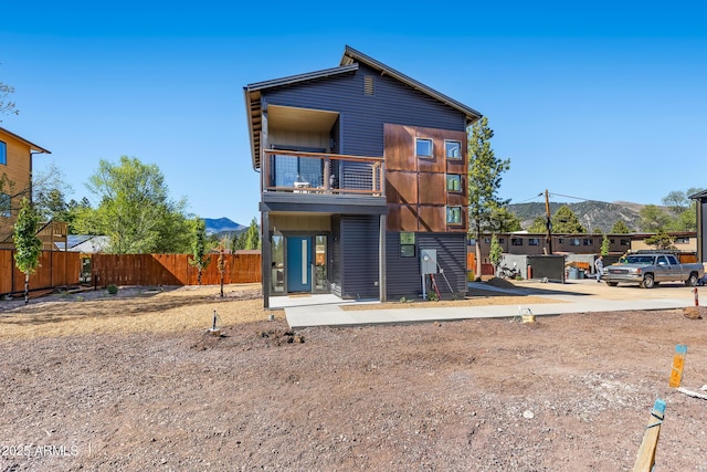 302 W Oak Ave Unit 2, Flagstaff, AZ 86001 - rear view of property featuring a balcony and a mountain view