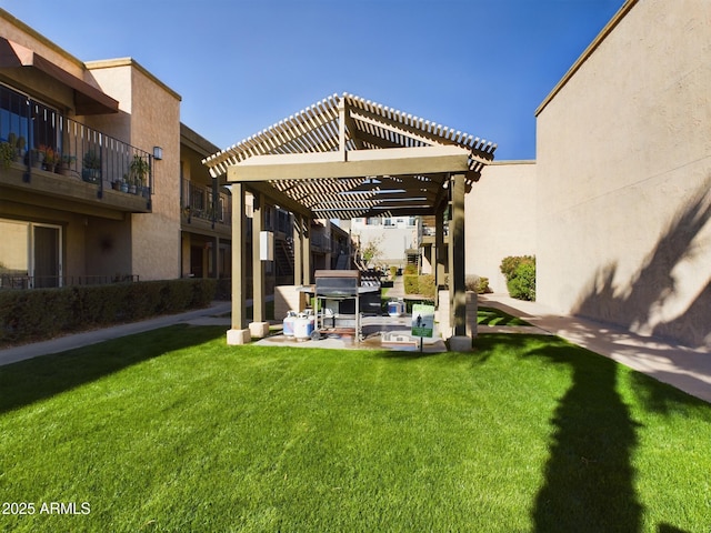 view of yard with a pergola and a patio