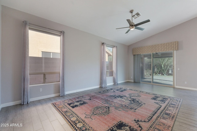 3055 N Red Mtn Unit 122, Mesa, AZ 85207 - spare room with a ceiling fan, wood finished floors, lofted ceiling, and baseboards