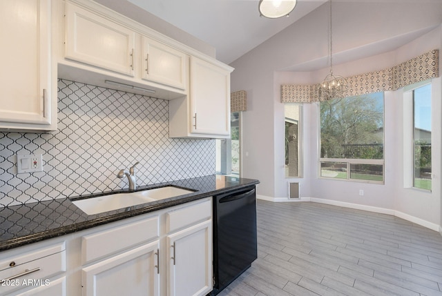 3055 N Red Mtn Unit 122, Mesa, AZ 85207 - kitchen featuring black dishwasher, lofted ceiling, a sink, a chandelier, and plenty of natural light