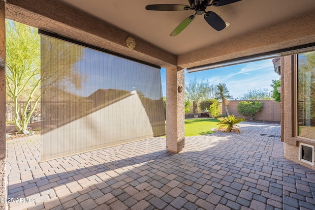 3055 N Red Mtn Unit 122, Mesa, AZ 85207 - fenced backyard with a patio area and a ceiling fan