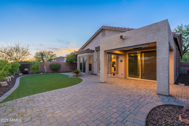 3055 N Red Mtn Unit 122, Mesa, AZ 85207 - rear view of house with a patio and stucco siding
