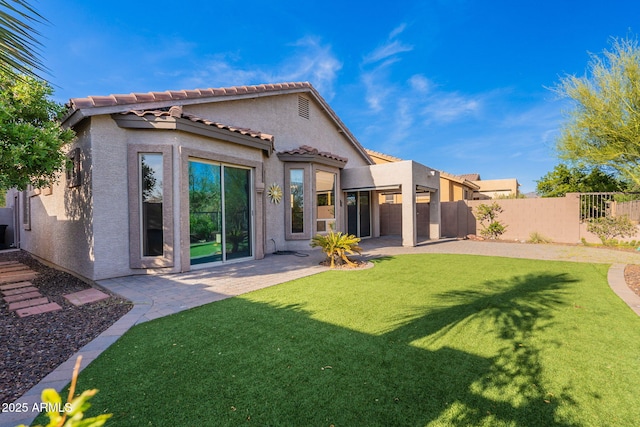 3055 N Red Mtn Unit 122, Mesa, AZ 85207 - rear view of property with stucco siding, a patio, and a tile roof