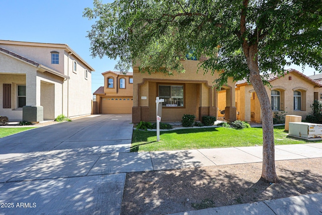 view of front of property with stucco siding, an attached garage, concrete driveway, and a front lawn