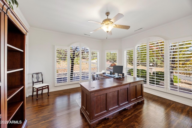 office area featuring dark hardwood / wood-style flooring, ornamental molding, and ceiling fan