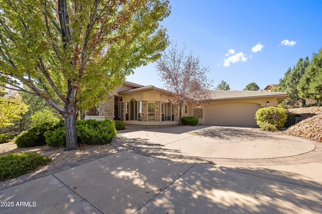 obstructed view of property featuring a garage