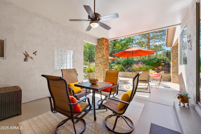 view of patio / terrace featuring ceiling fan