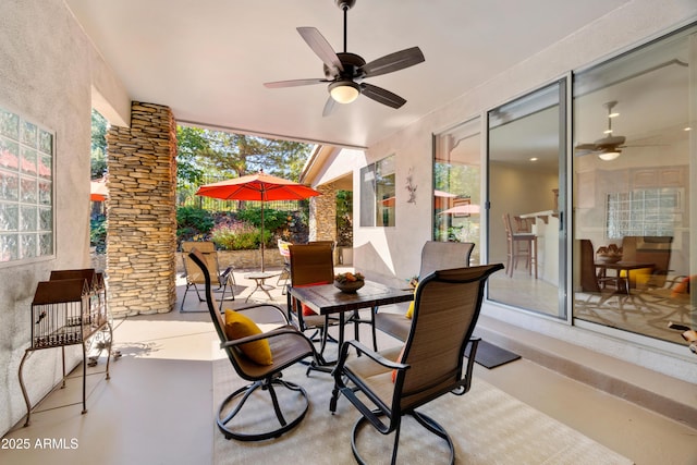 view of patio with ceiling fan