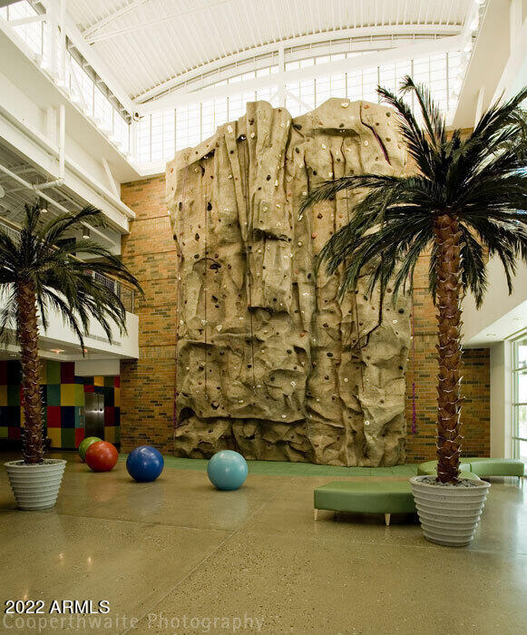 workout room with a high ceiling