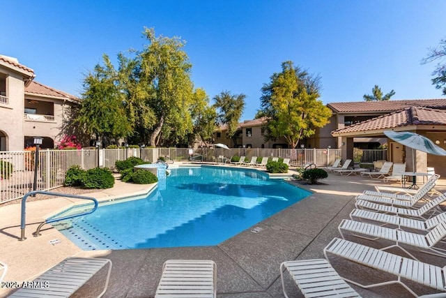 view of swimming pool with a patio