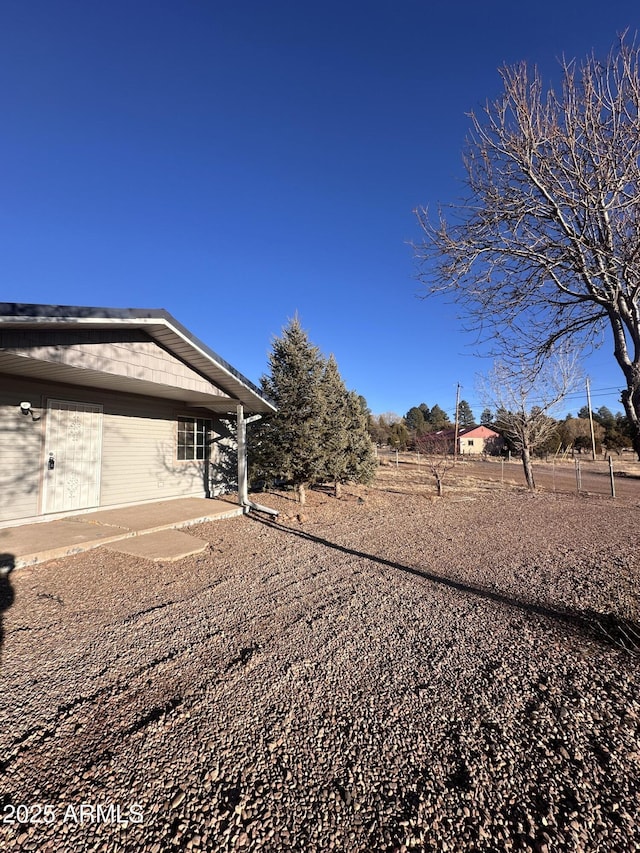 view of yard with a patio area and fence