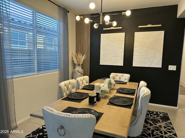 dining space featuring an inviting chandelier and light tile patterned floors