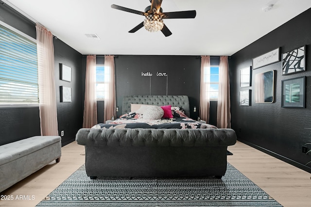 22501 E Indiana Ave, Queen Creek, AZ 85142 - bedroom featuring ceiling fan and light hardwood / wood-style floors