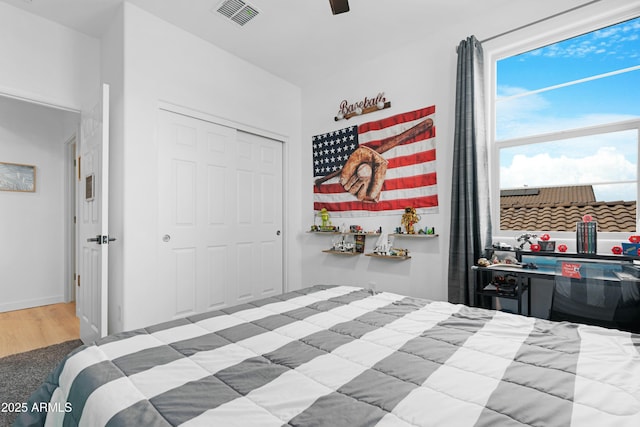 22501 E Indiana Ave, Queen Creek, AZ 85142 - bedroom with hardwood / wood-style floors and ceiling fan