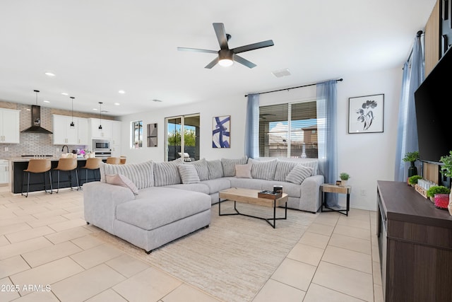 22501 E Indiana Ave, Queen Creek, AZ 85142 - living room with light tile patterned flooring and ceiling fan