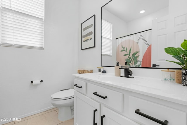 22501 E Indiana Ave, Queen Creek, AZ 85142 - bathroom featuring vanity, tile patterned flooring, and toilet