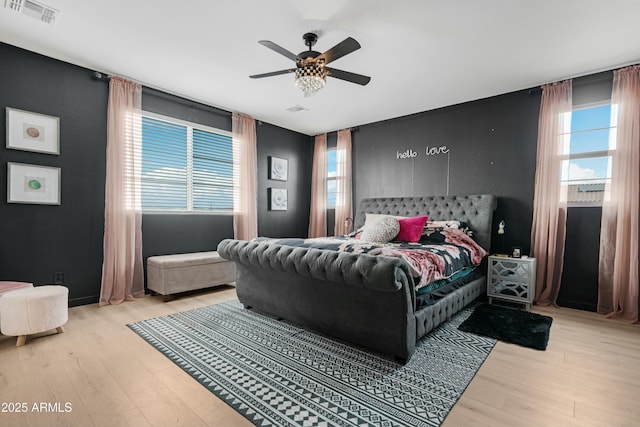 22501 E Indiana Ave, Queen Creek, AZ 85142 - bedroom with ceiling fan and light hardwood / wood-style floors