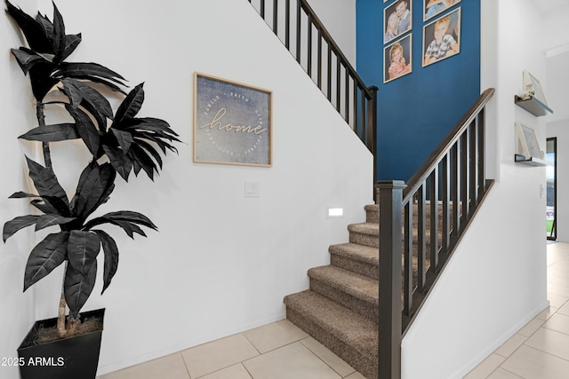 22501 E Indiana Ave, Queen Creek, AZ 85142 - stairway with tile patterned flooring and a high ceiling