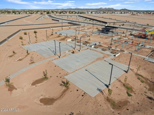 birds eye view of property featuring a mountain view