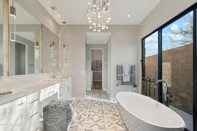 bathroom with vanity and a bathing tub