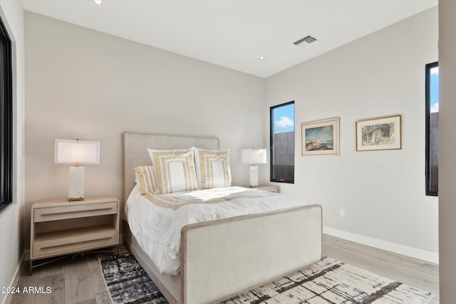 bedroom with light hardwood / wood-style floors