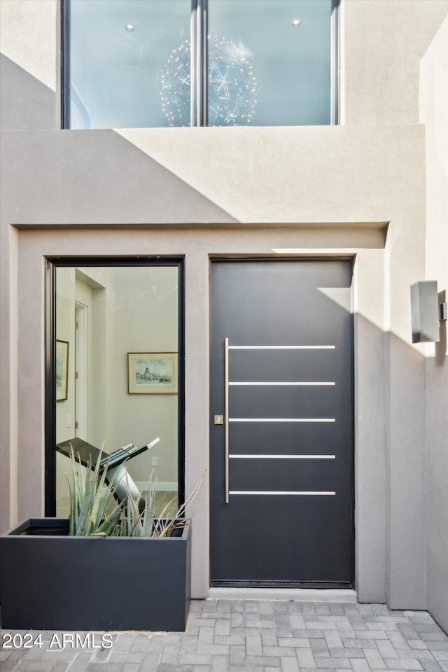 entrance to property featuring a garage