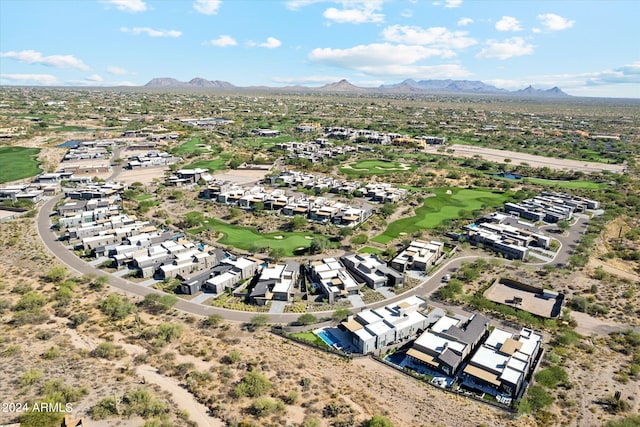 birds eye view of property featuring a mountain view