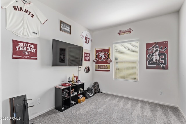 playroom with carpet flooring and baseboards